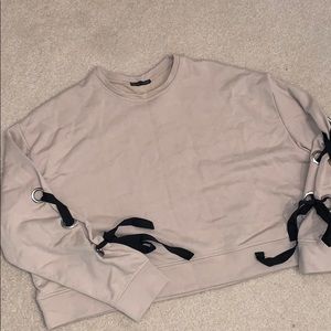 Oversized tan sweatshirt - black lace up sleeves